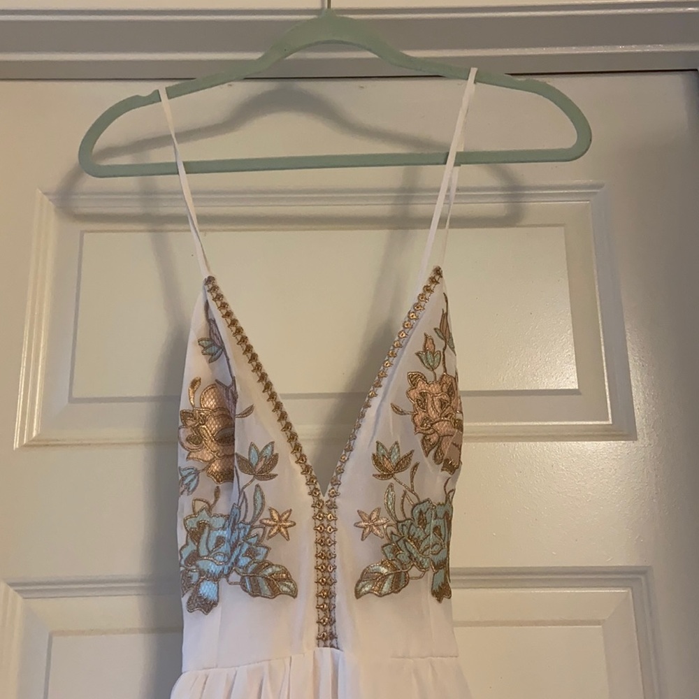 The cutest maxi dress. Worn once - beach wedding.